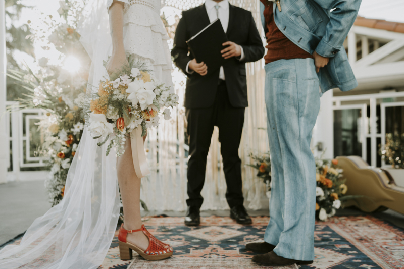 Ceremony with legs in view.