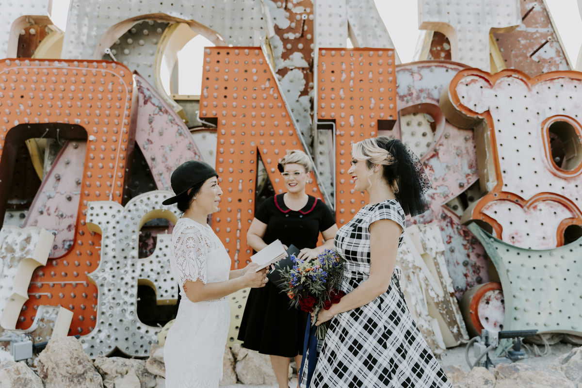 two brides saying their wedding vows